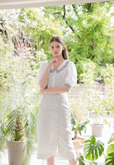 High-Waisted Button-Front Linen Midi Skirt with Soft Drape and Side Slit Detail