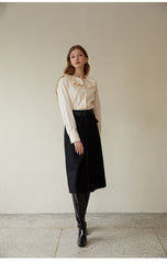 Elegant Linen Blouse with Ruffled Collar and Button-Front Design for Timeless Feminine Style