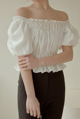 Off-Shoulder Smocked Linen Blouse With Puff Sleeves And Ruffled Hem For Elegant Casual Wear