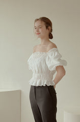 Off-Shoulder Smocked Linen Blouse With Puff Sleeves And Ruffled Hem For Elegant Casual Wear