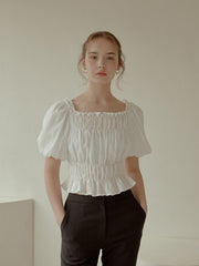 Off-Shoulder Smocked Linen Blouse With Puff Sleeves And Ruffled Hem For Elegant Casual Wear