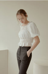 Off-Shoulder Smocked Linen Blouse With Puff Sleeves And Ruffled Hem For Elegant Casual Wear