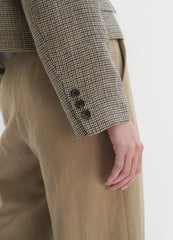 High-Waisted Pleated Linen Pants with Tapered Leg and Cuffed Hem