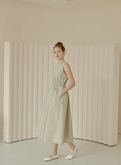 Sleeveless Gathered Waist Linen Midi Dress with Flared Skirt and Minimalist Silhouette