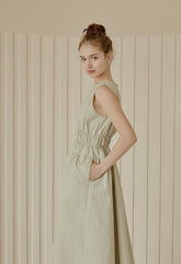 Sleeveless Gathered Waist Linen Midi Dress with Flared Skirt and Minimalist Silhouette
