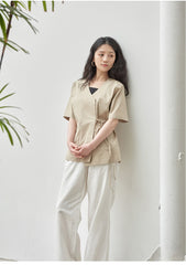 High-Rise Wide-Leg Linen Pants with Relaxed Fit and Pleated Front Detailing