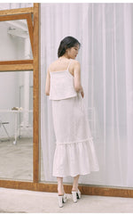Mid-Length Flared Linen Skirt with Layered Hem and Adjustable Side Ties