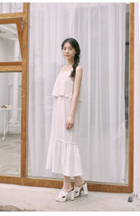 Mid-Length Flared Linen Skirt with Layered Hem and Adjustable Side Ties