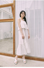 Mid-Length Flared Linen Skirt with Layered Hem and Adjustable Side Ties