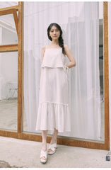 Mid-Length Flared Linen Skirt with Layered Hem and Adjustable Side Ties