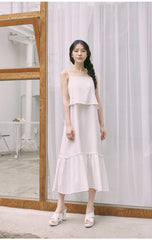 Mid-Length Flared Linen Skirt with Layered Hem and Adjustable Side Ties