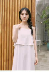 Mid-Length Flared Linen Skirt with Layered Hem and Adjustable Side Ties