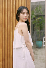 Mid-Length Flared Linen Skirt with Layered Hem and Adjustable Side Ties