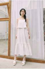 Mid-Length Flared Linen Skirt with Layered Hem and Adjustable Side Ties