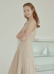 Sleeveless Linen Midi Dress with Fitted Bodice, Flared Hem, and Seam Detailing for Structure