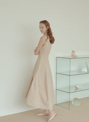Sleeveless Linen Midi Dress with Fitted Bodice, Flared Hem, and Seam Detailing for Structure