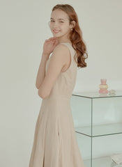 Sleeveless Linen Midi Dress with Fitted Bodice, Flared Hem, and Seam Detailing for Structure