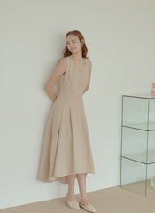 Sleeveless Linen Midi Dress with Fitted Bodice, Flared Hem, and Seam Detailing for Structure