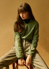 Soft velvet long-sleeve shirt with classic collar and structured silhouette for modern styling