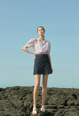 Sheer Silk Short-Sleeve Blouse With Tailored Collar and Pearl Button Accents for Elegant Summer Wear