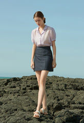 Sheer Silk Short-Sleeve Blouse With Tailored Collar and Pearl Button Accents for Elegant Summer Wear