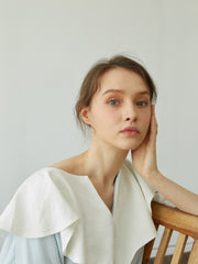 Linen Dress with Oversized Ruffle Collar and Asymmetric Hemline for Soft Feminine Statement Style