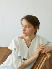 Linen Dress with Oversized Ruffle Collar and Asymmetric Hemline for Soft Feminine Statement Style