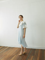 Linen Dress with Oversized Ruffle Collar and Asymmetric Hemline for Soft Feminine Statement Style