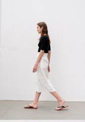 High-Waisted Midi Linen Skirt with Tailored Pleats and Back Vent for Elegant Everyday Style
