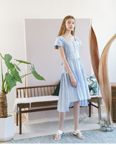 Feminine Pleated Midi Dress Crafted In Breathable Linen With Puff Sleeves And Tie-Back Waist