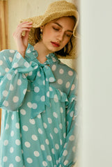 Polka Dot Chiffon Midi Dress with Long Sleeves, Ruffle Trim, and Feminine Bow Tie Neckline