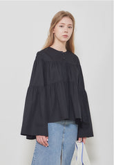 Soft-Structured Linen Blouse with Tiered Silhouette and Flared Sleeves