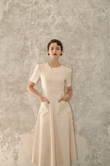 Elegant Midi Dress In Premium Linen With Tailored Seams And Structured Short Sleeves