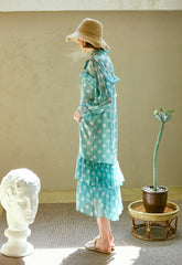 Polka Dot Chiffon Midi Dress with Long Sleeves, Ruffle Trim, and Feminine Bow Tie Neckline