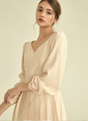 Elegant Long Sleeve Midi Linen Dress with Flared Pleated Skirt and Flattering V-Neckline