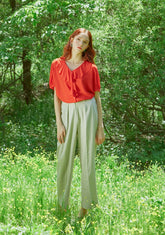 Linen Blouse With Soft Pleats And Relaxed Tie-Neck Detail