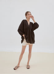 Relaxed Fit Linen Top with Gathered Waist and Deep V-Neckline for Effortless Statement Styling