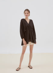 Relaxed Fit Linen Top with Gathered Waist and Deep V-Neckline for Effortless Statement Styling