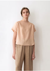 Short-Sleeve Linen Blouse With Boat Neckline And Relaxed Cropped Fit For Warm Weather