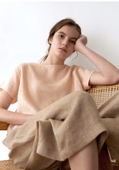 Short-Sleeve Linen Blouse With Boat Neckline And Relaxed Cropped Fit For Warm Weather