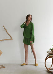 Silk Wrap Blouse With Adjustable Tie Details And Flowy Long Sleeves