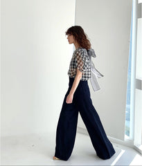 High-Waisted Wide-Leg Linen Pants With Front Pleats and Statement Button Detail