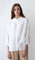 Long-Sleeve Button-Up Linen Blouse With Tie-Cuff Sleeves And Rounded Collar Detail