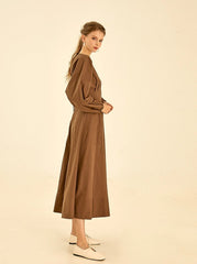 Elegant Cotton Poplin V-Neck Dress With Long Sleeves And Flared Midi Skirt For Timeless Style        4o