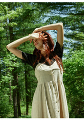 Asymmetric Button-Front Linen Dress with Spaghetti Straps and Flowing Skirt