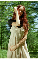 Asymmetric Button-Front Linen Dress with Spaghetti Straps and Flowing Skirt