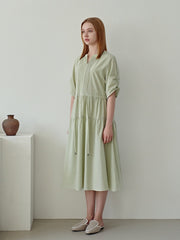 Elegant Pleated Linen Midi Dress with Tiered Skirt and Drawstring Waist Detail