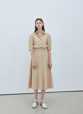 High-Waisted Flared Linen Midi Skirt with Structured Waistband and Fluid Silhouette