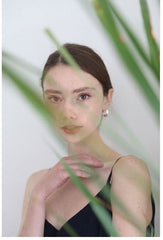 Elegant Sleeveless Midi Linen Dress with Side Ties and Lightweight Textured Finish