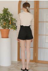 Linen Blouse With Smocked Waist, Tie Neckline, And Puff Sleeves For A Romantic Silhouette